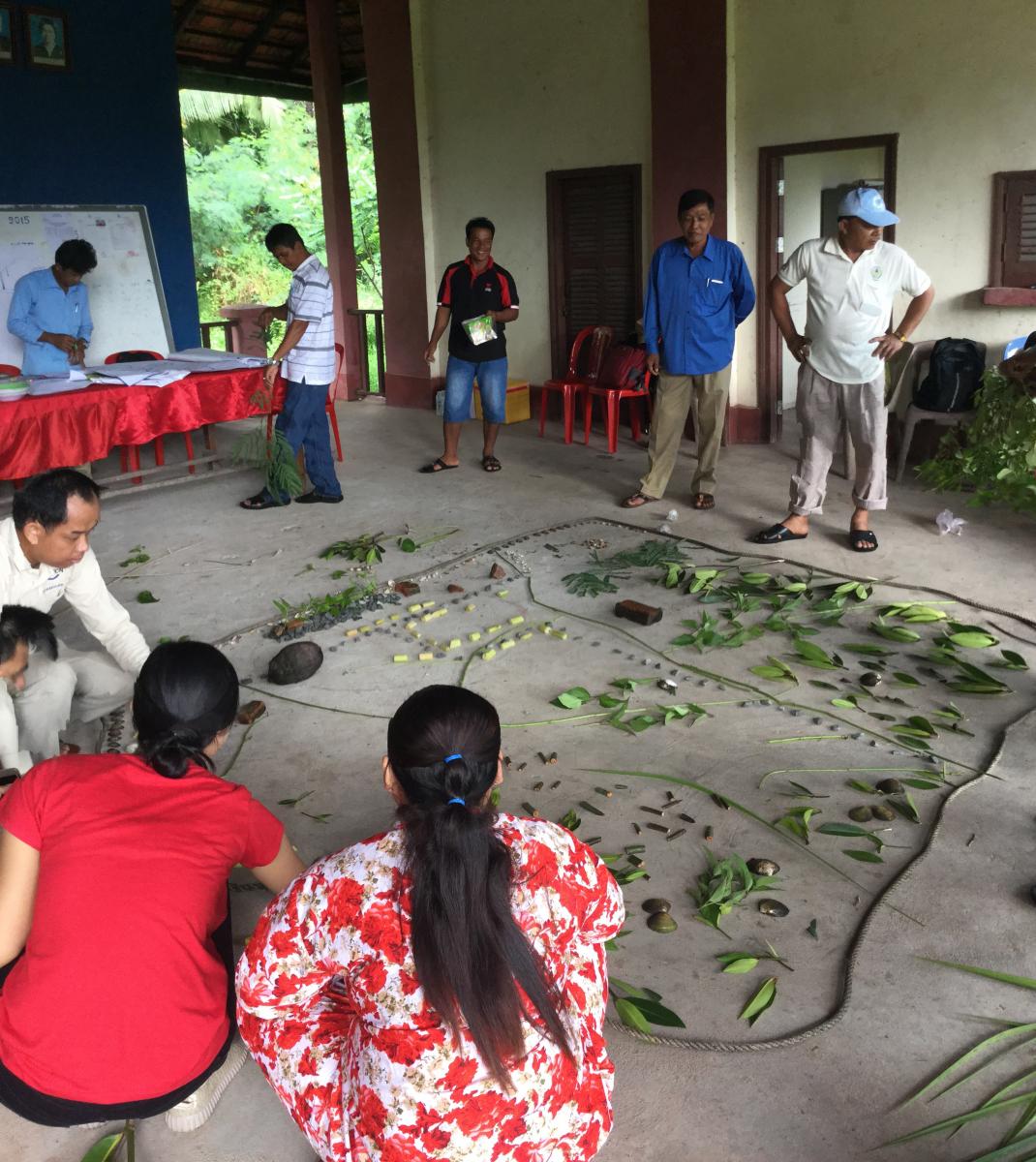 Villagers use the organic map to identify points of interest