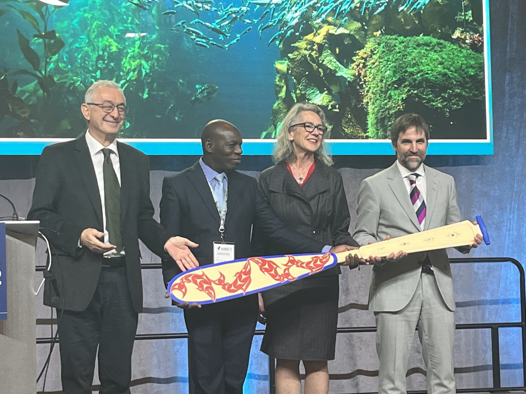 First Nations Legendary Paddle passed from IMPAC5 hosts Canada to IMPAC6 host nation Senegal