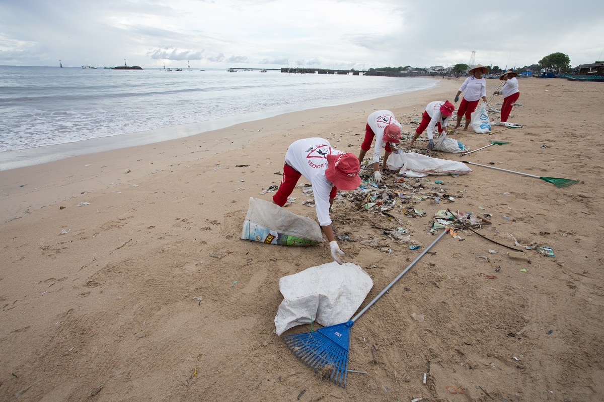 Beach clean-up programme in action in Bali, Indonesia
