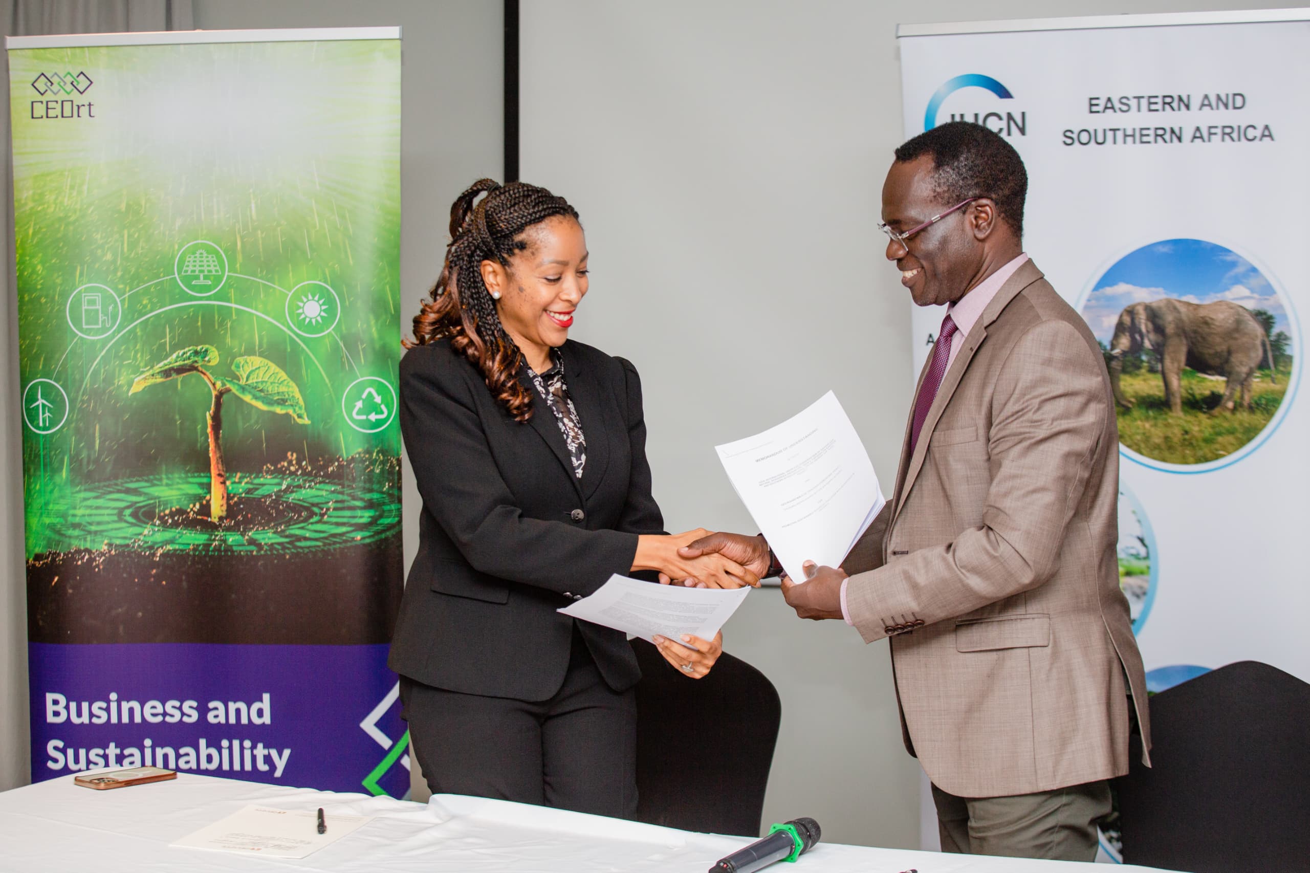 Luther Anukur and Santina Benson during the MoU signing between IUCN and the CEO Round Table in Dar-es-Salaam, Tanzania