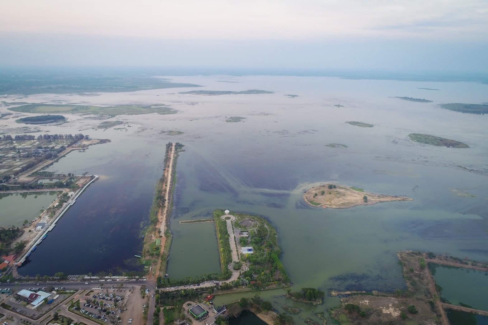 Aerial view of wetland and neighbouring city