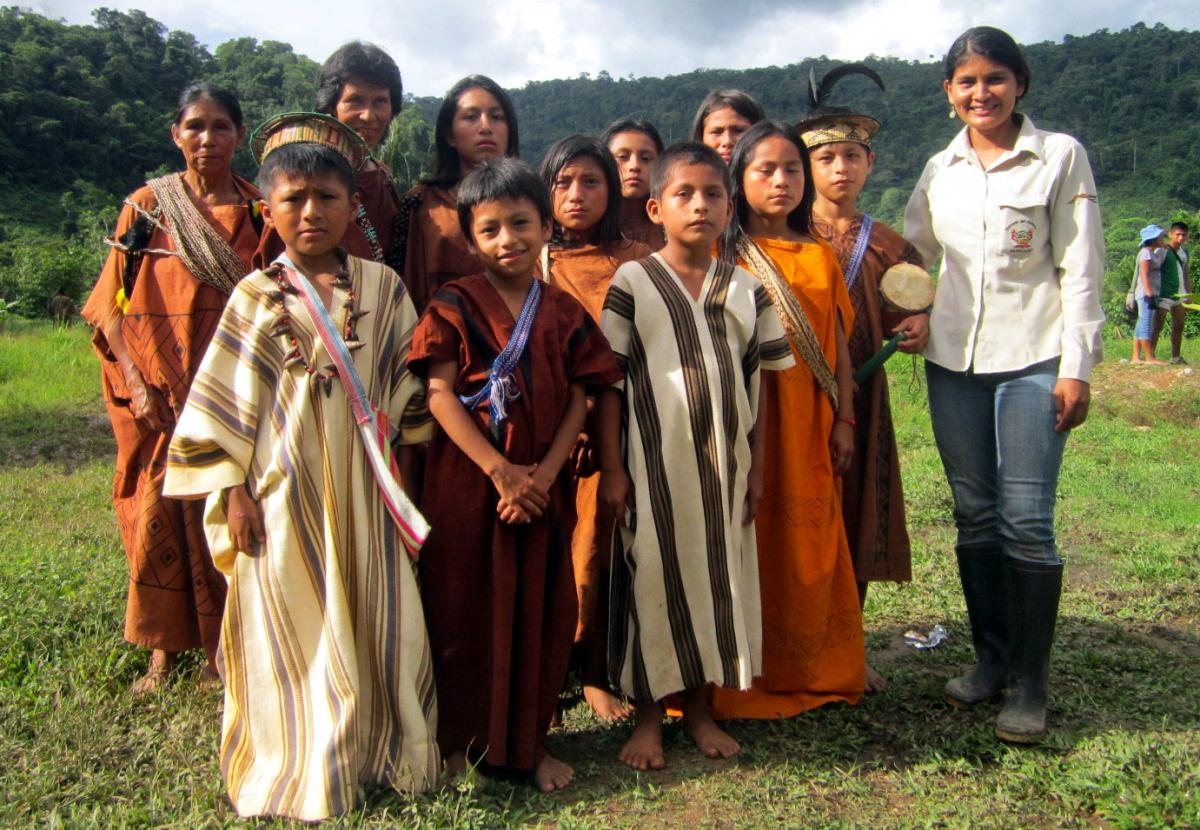 Celsa Ortiz with Yanesha children at a traditional ceremony