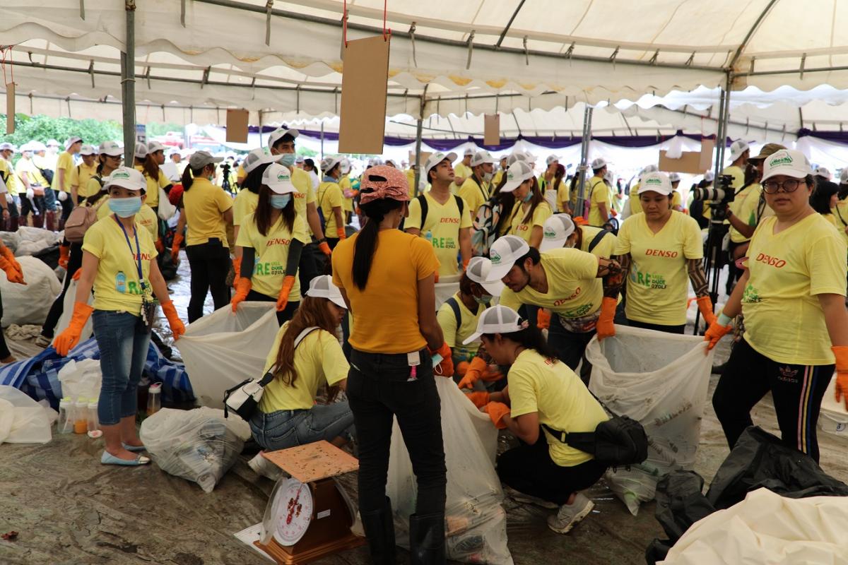 Volunteers segregate collected waste according to pre-defined categories