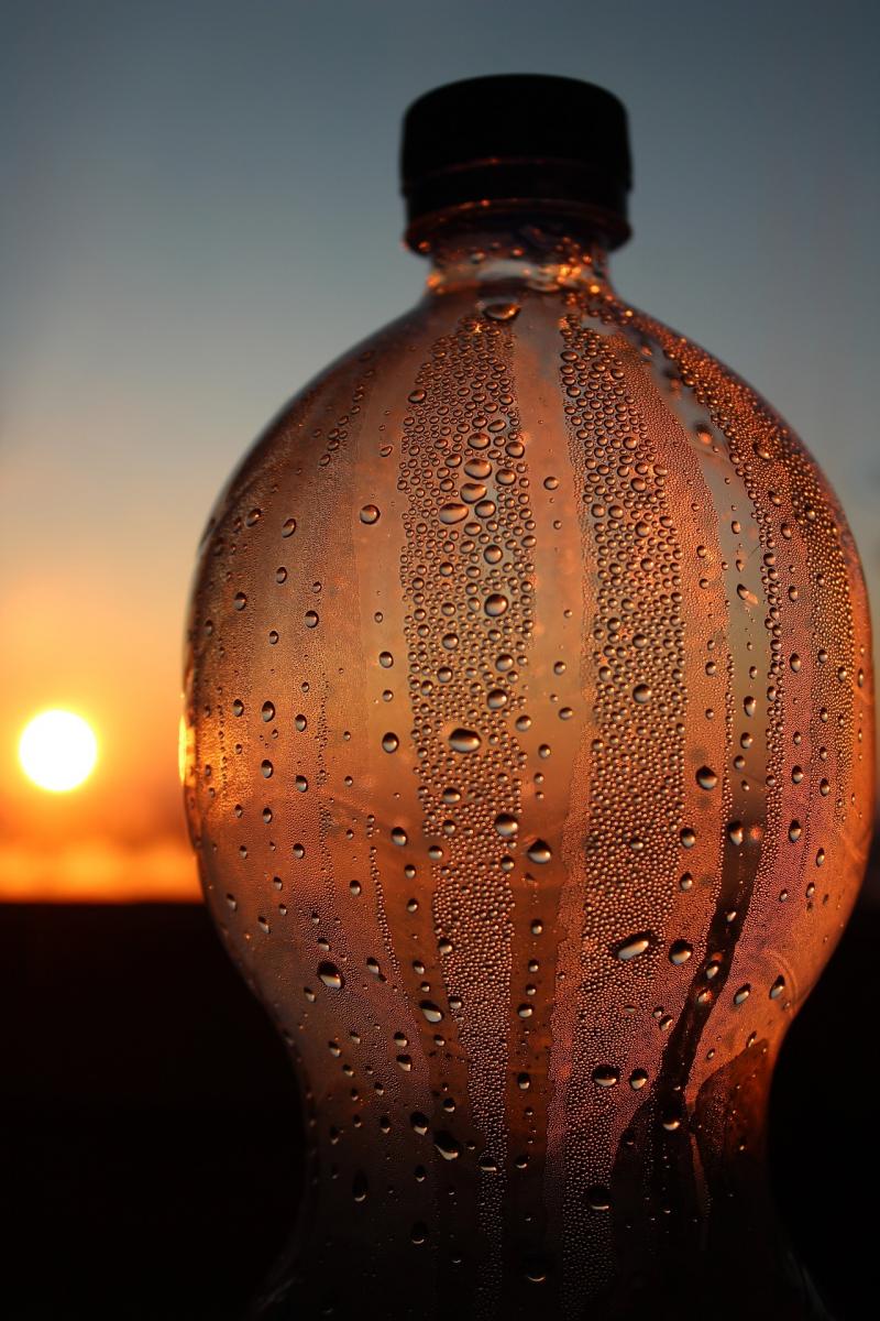 Sunset through plastic bottle