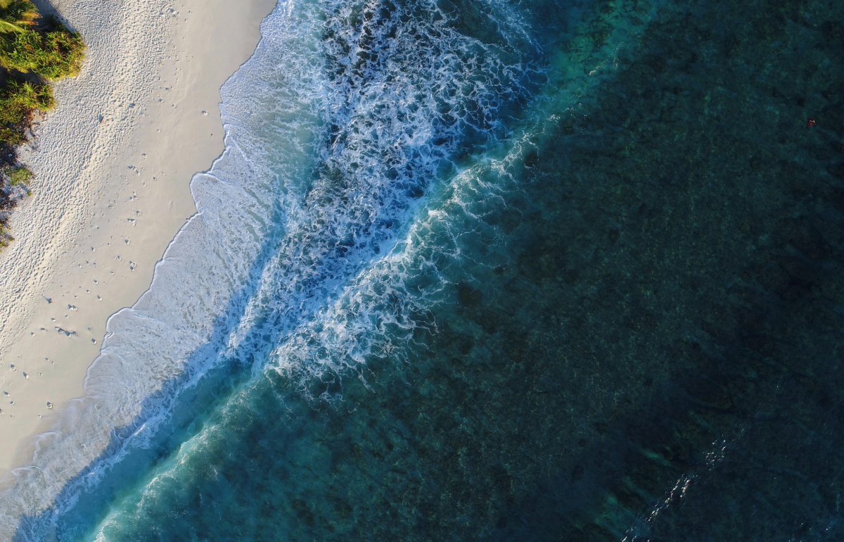 Aerial view of beach and waves