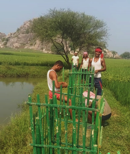 Farmers engaged in wetlands and plant protection activities Munger Bihar, India