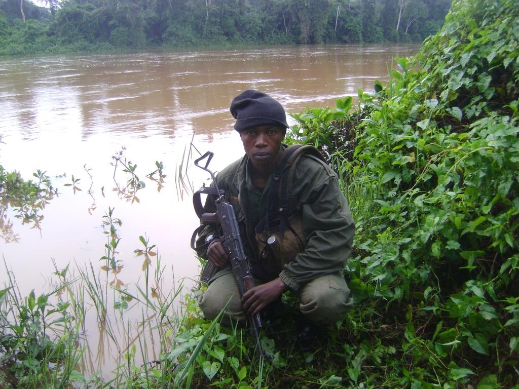 Benjamin on patrol by the Ituri River