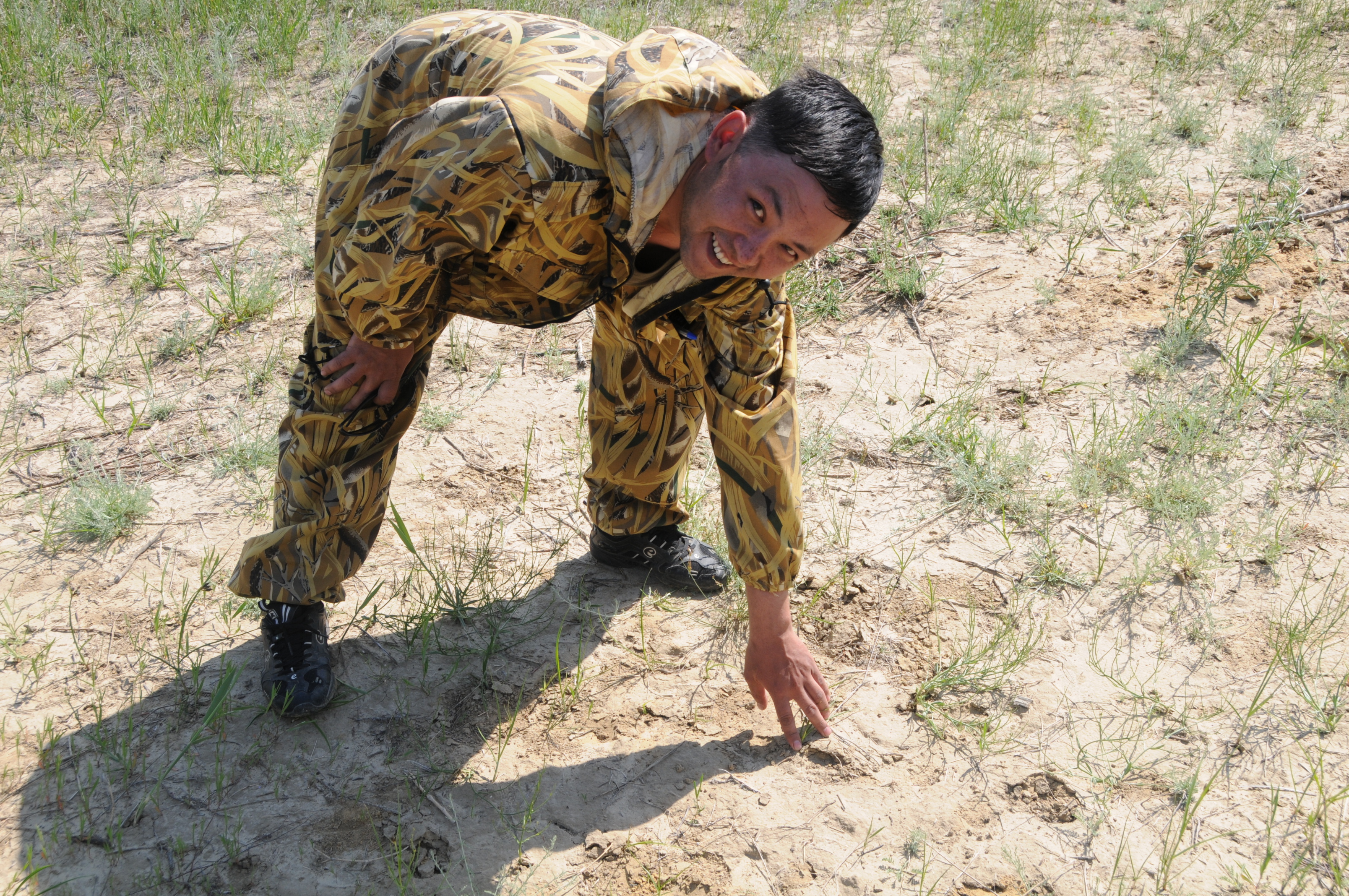 Ranger showing Saiga tracks in Kazakhstan