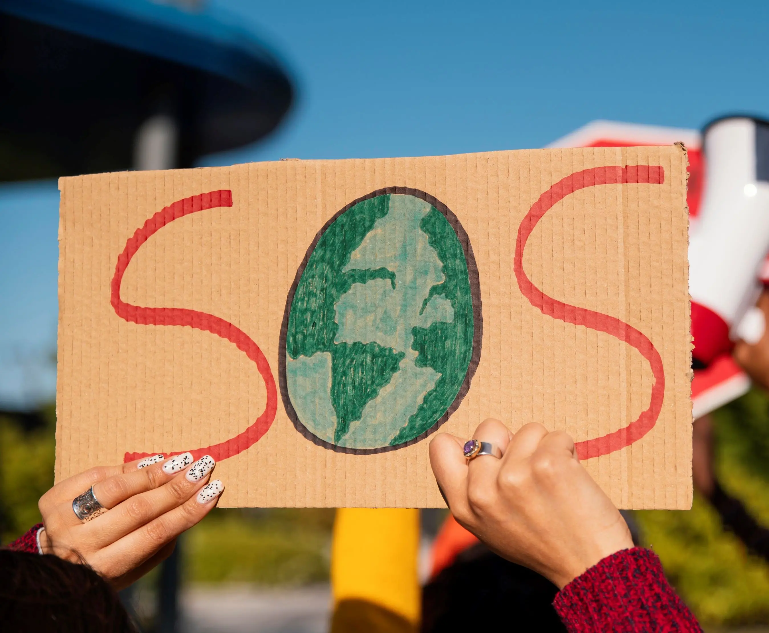 hands holding SOS sign