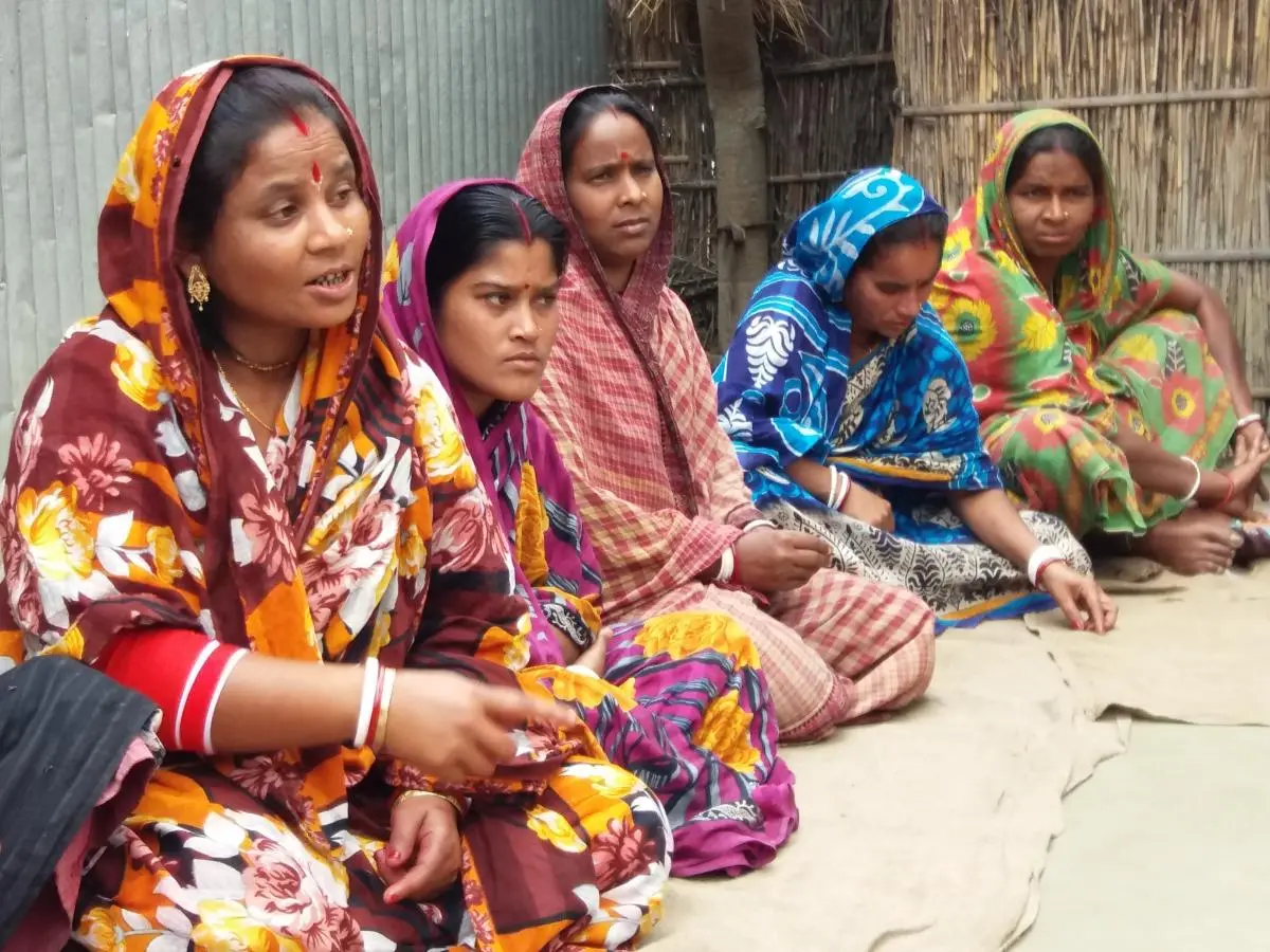 Wives of fishermen sharing their stories of living on the bank of the River Brahmaputra in Chilmari, Bangladesh.