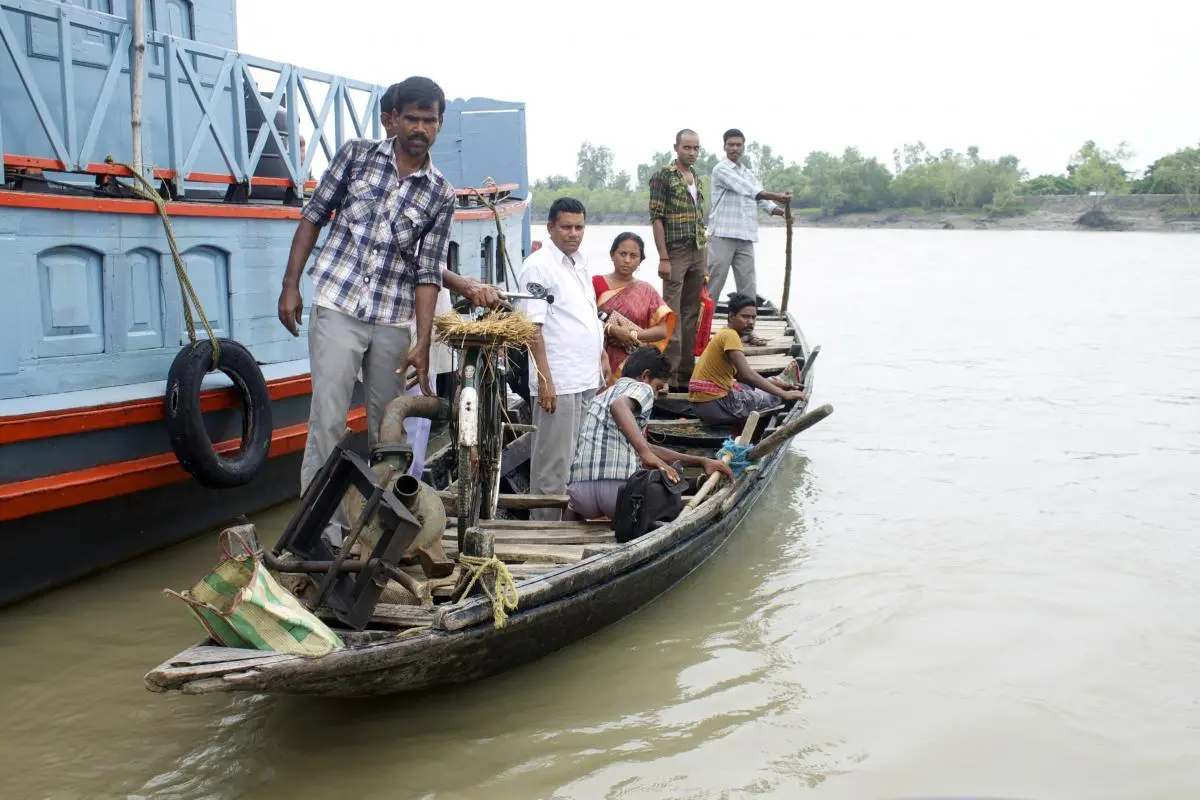 Communities travel to and fro with their belongings between the islands of the Indian Sundarban. 